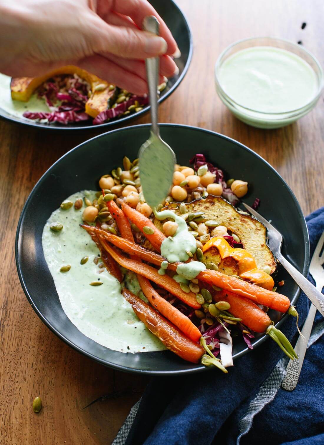 Green goddess yogurt sauce on roasted veggies and whole grains