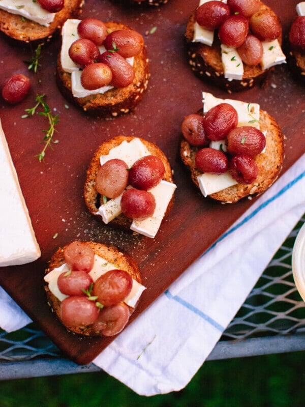 Jammy roasted grapes on brie and toast make a simple, seasonal appetizer!