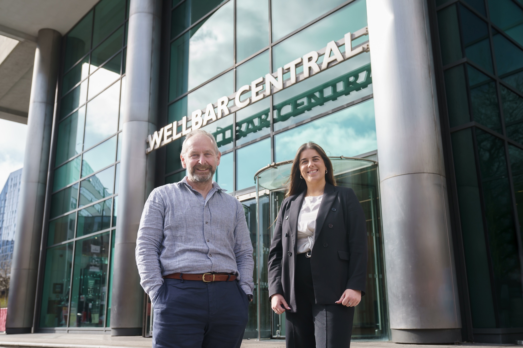 Adam Scorer of NEA and Emma Young of Savills outside Wellbar at Gallowgate in Newcastle