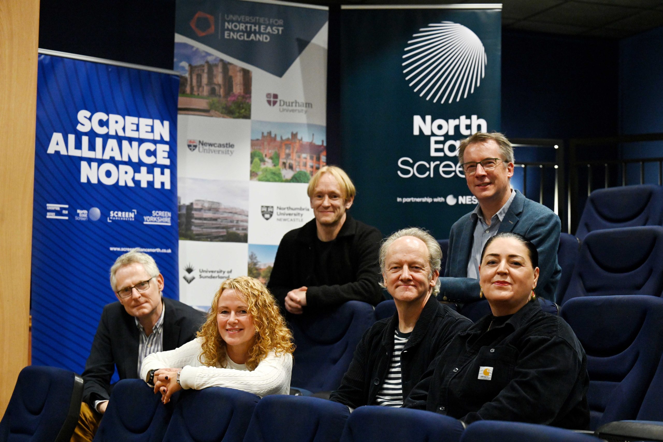 Leaders from north east universities sat in cinema seats together.